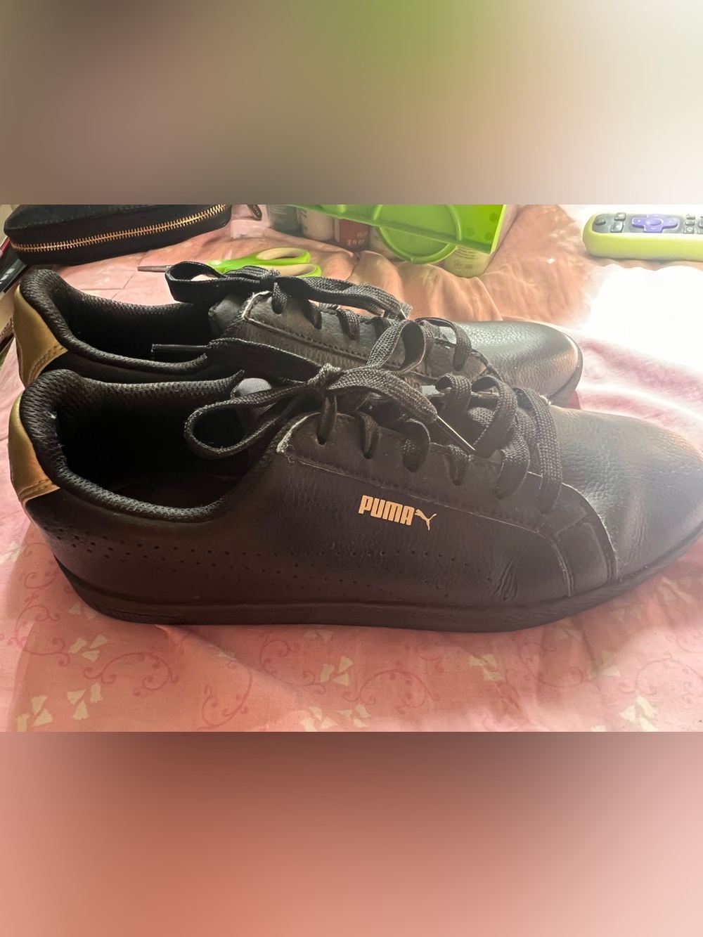 Puma Women’s Black Sneakers with Gold Heel Accent